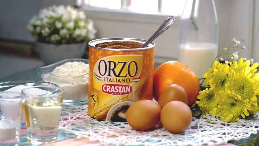 Un dolce semplice, soffice e profumato perfetto per la tavola di Pasqua. Scopri la ricetta della ciambella con glassa all&rsquo;orzo Crastan, ideale per colazione o merenda.